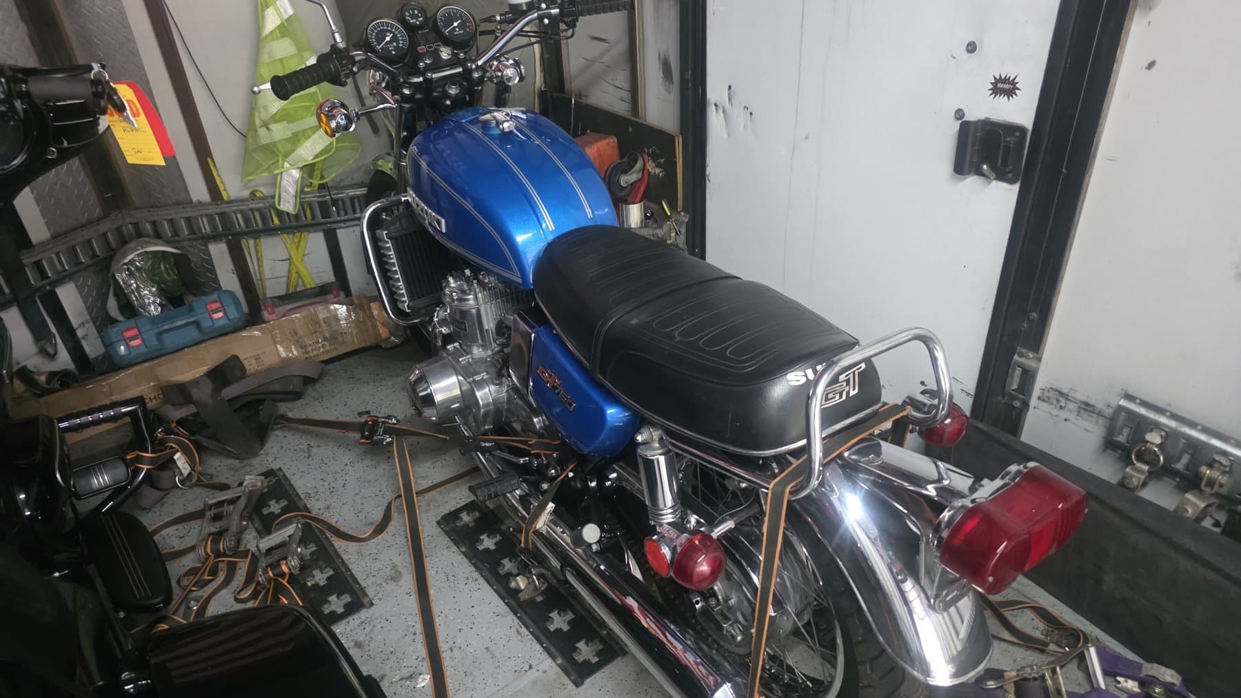 Rear view of the restored Suzuki GT750 secured for enclosed transportation